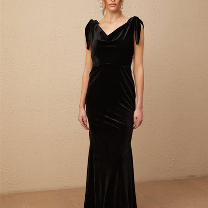 Vittoria Black Velvet Maxi Dress with Cowl Neck and Open Back Bow detail adorned with Faux-Pearls Train Design and Rear Zip Fastening