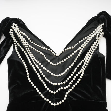 Vittoria Black Velvet Maxi Dress with Cowl Neck and Open Back Bow detail adorned with Faux-Pearls Train Design and Rear Zip Fastening