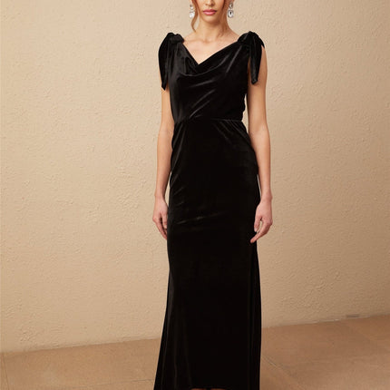 Vittoria Black Velvet Maxi Dress with Cowl Neck and Open Back Bow detail adorned with Faux-Pearls