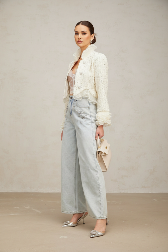 A white cropped jacket with beaded embellishments and ruffle details named Blanche | Hair Updated