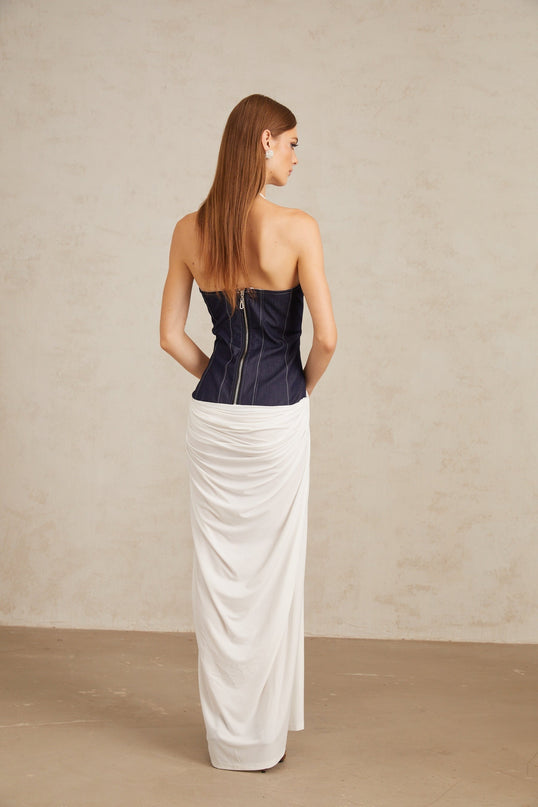 Vittoria White Indigo Blue Maxi Dress Halterneck Fitted Waistline Boned Bodice Denim Panelling Color Blocked Front Slit Rear Zip Fastening Terylene Fiber Statement Piece