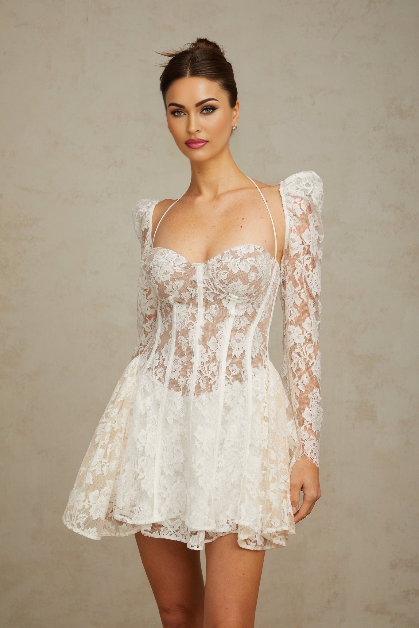 Vivienne white mini dress with floral lace design and corset style bodice