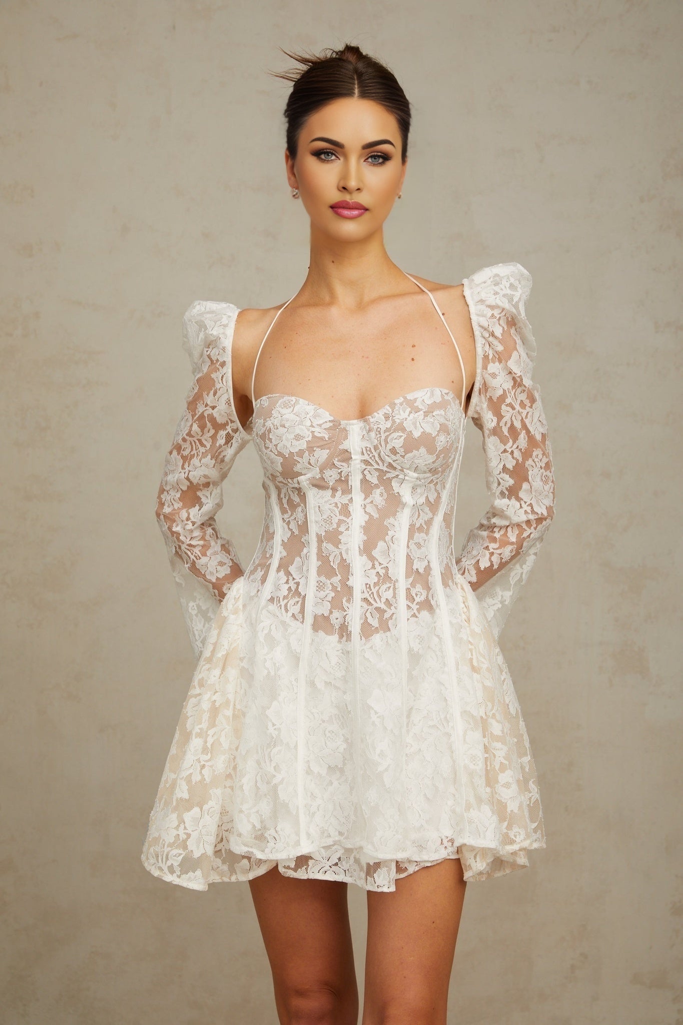 Vivienne white mini dress with floral lace detailing and corset style bodice
