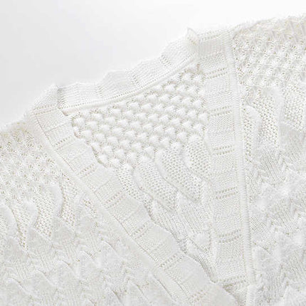 White A-line silhouette with button front textured knit pattern details relaxed fit flattering shape elegant for casual or dressy looks lightweight breathable fabric pockets and scalloped neckline perfect for brunch or beach outings timeless and chic beach cover-up