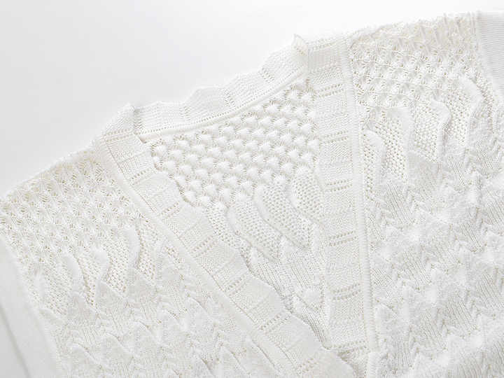 White A-line silhouette with button front textured knit pattern details relaxed fit flattering shape elegant for casual or dressy looks lightweight breathable fabric pockets and scalloped neckline perfect for brunch or beach outings timeless and chic beach cover-up