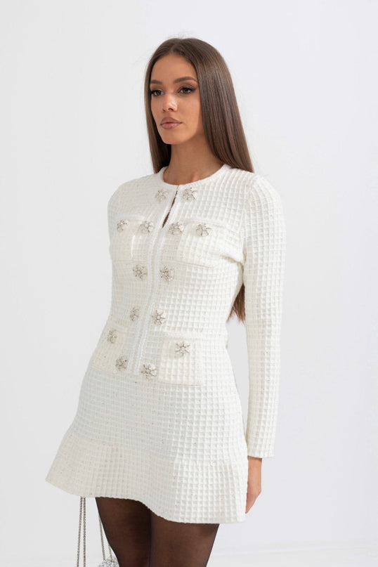 White A-line silhouette dress with textured fabric and button detailing