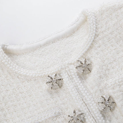 White A-line silhouette dress with textured fabric and button detailing