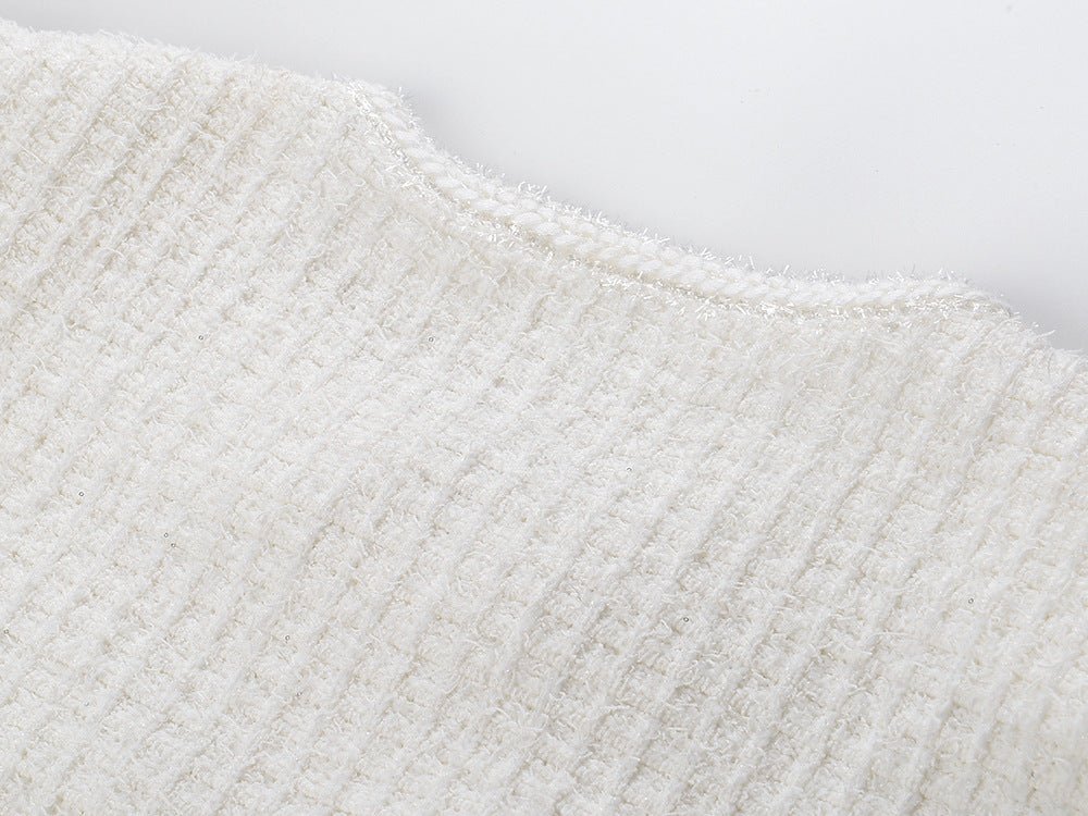 White A-line silhouette dress with button detailing and textured fabric, perfect for spring or autumn