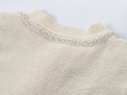 White A-line silhouette with fitted bodice button-down pleated skirt lightweight knitted fabric embellished buttons pockets formal events