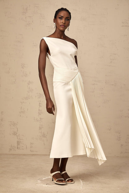 White asymmetric draped midi dress with side slit and flowing fabric