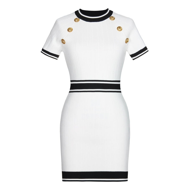 White bodycon dress with nautical-inspired stripe details and gold-tone embossed buttons