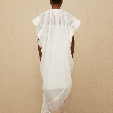 White cotton maxi dress with floral embroidery and cut-out detailing