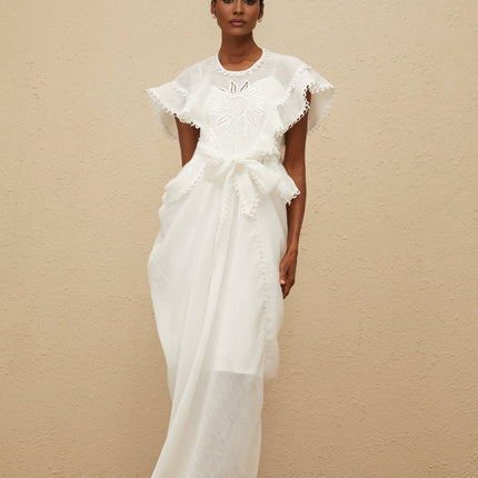 White cotton maxi dress with floral embroidery and cut-out detailing