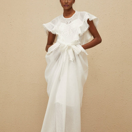 White cotton maxi dress with floral embroidery and tied waist