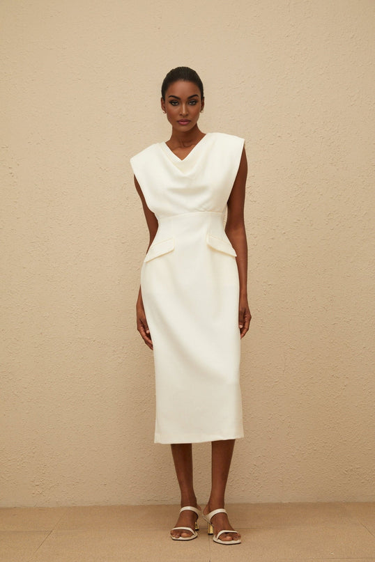 White cowl neck cap sleeve pencil silhouette dress with faux pocket detailing and rear slit