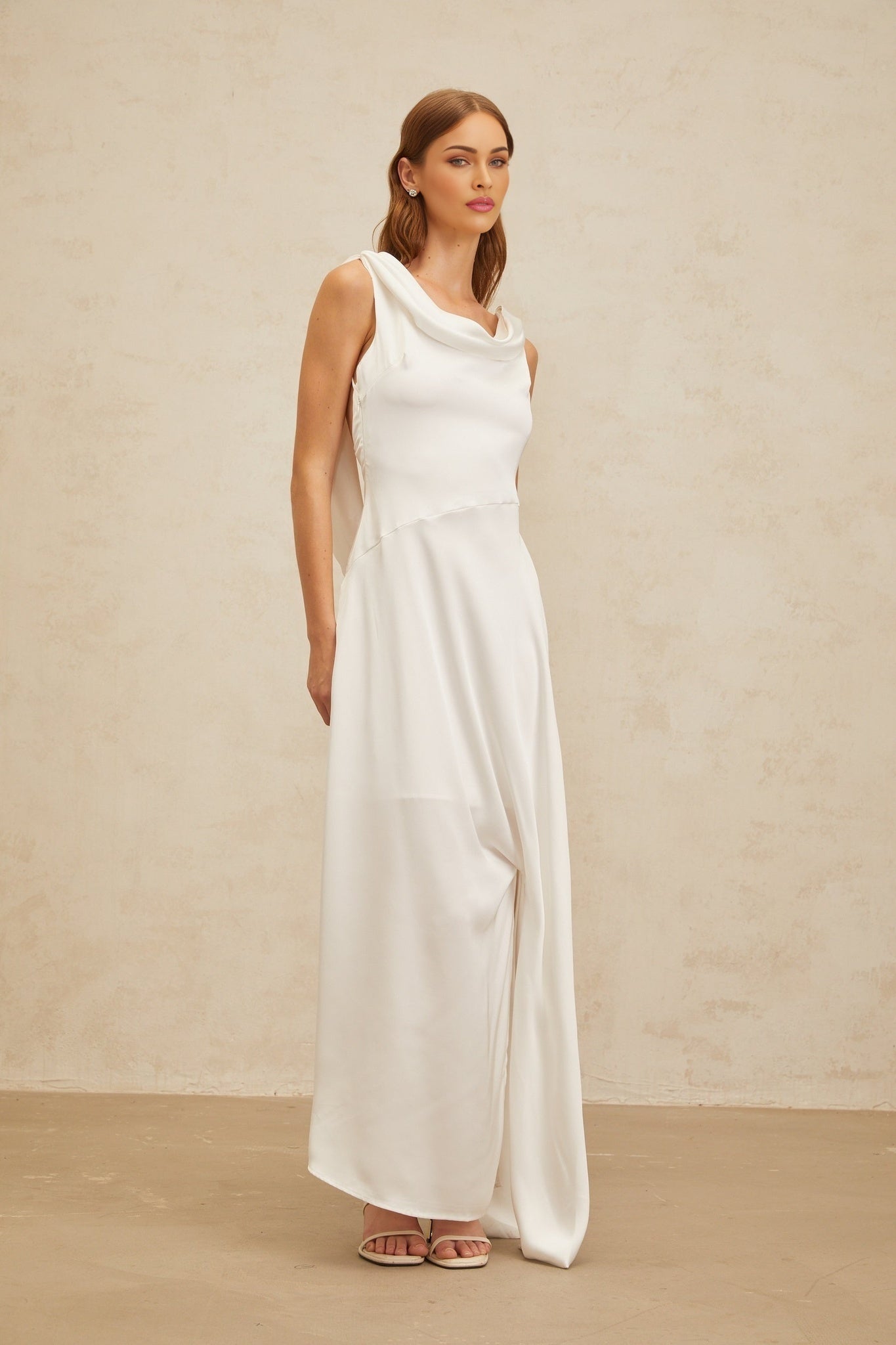 White cowl neck sleeveless maxi dress with twist detailing and satin finish