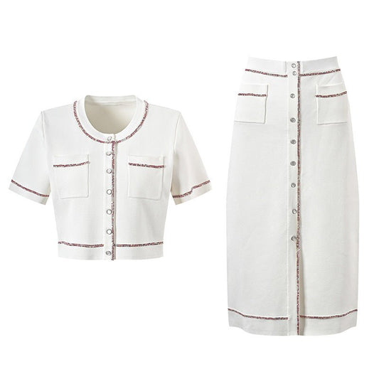 White cropped top and high-waisted skirt with pocket details and contrast trim