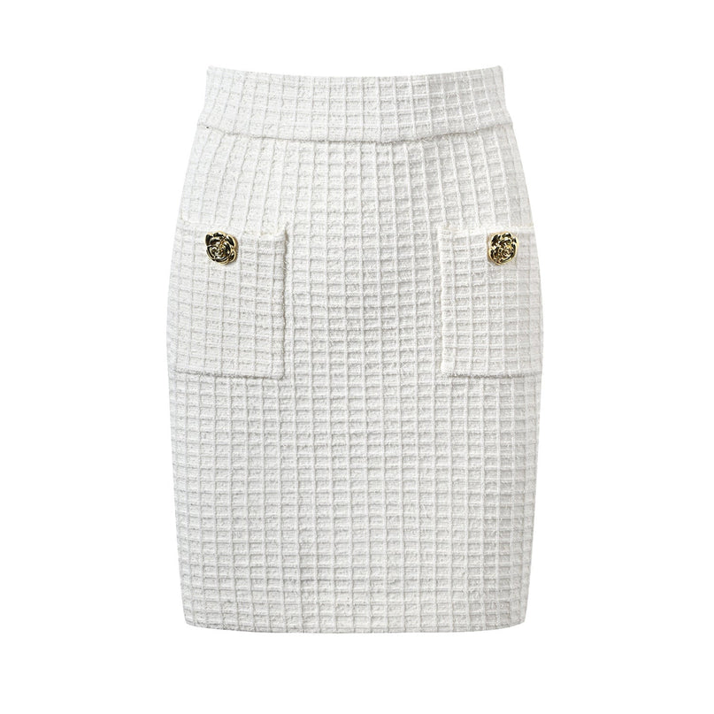 White double-breasted blazer with golden accents and textured fabric