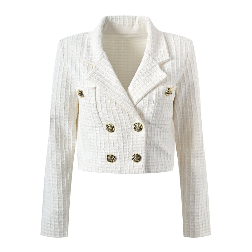 White double-breasted blazer and skirt set with gold accents