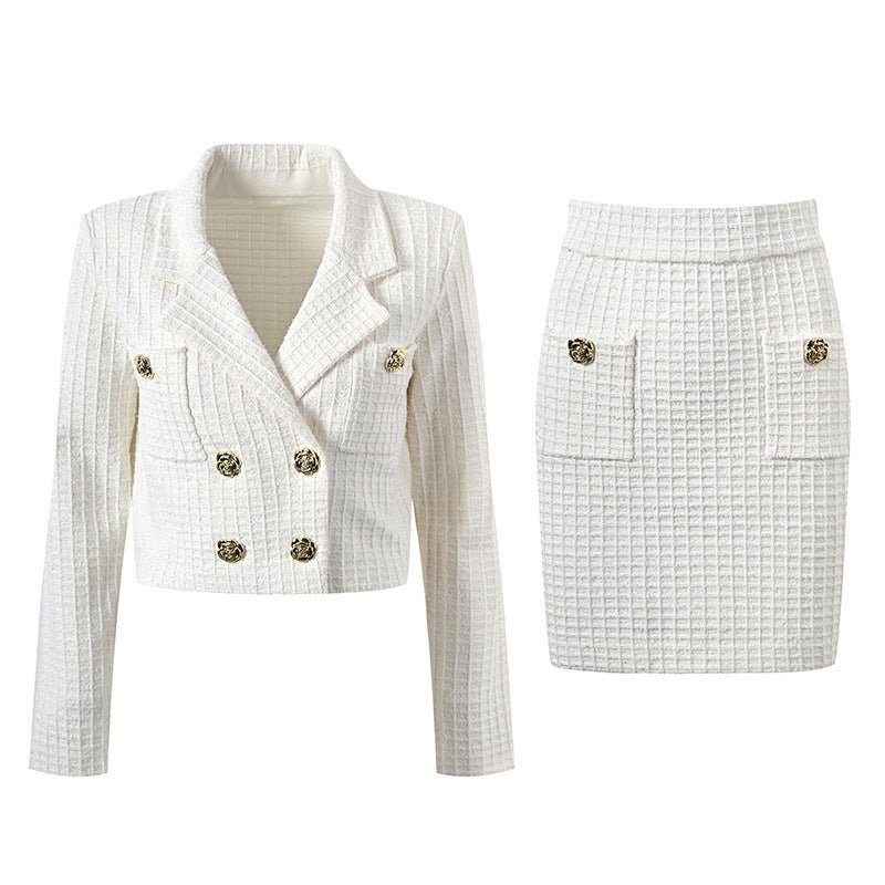 White double-breasted cropped blazer with fitted skirt and gold accents