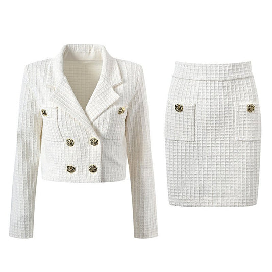 White double-breasted cropped blazer with fitted skirt and gold accents