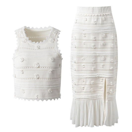 White embroidered crop top and skirt set with scalloped edges and boho-chic vibe
