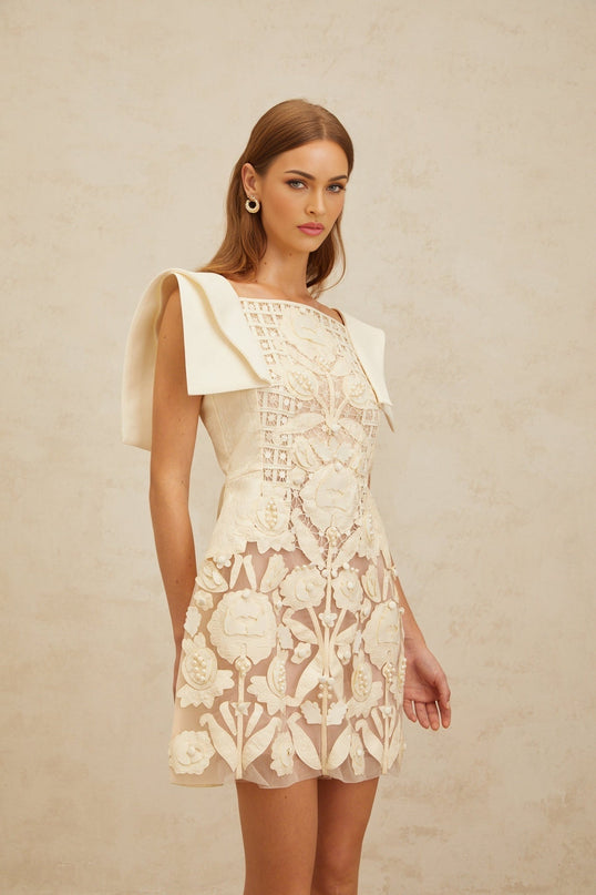 White floral jacquard A-line dress with crochet detailing and bead embellishment