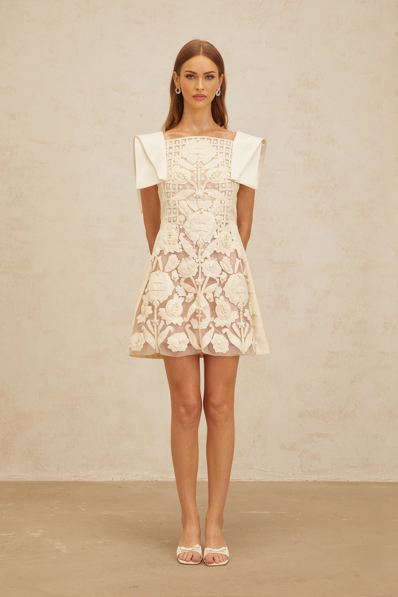 White floral jacquard A-line dress with crochet detailing and bead embellishment