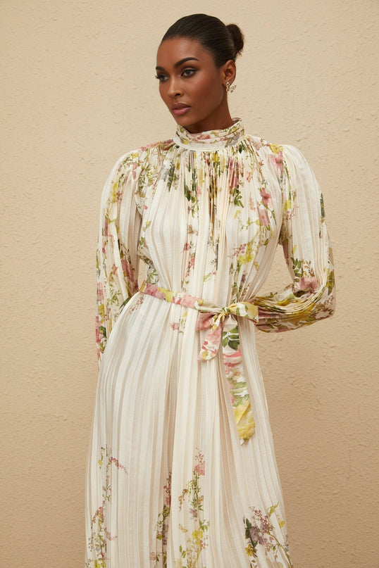 White floral print turtleneck midi dress with cinched waist and buttoned cuffs