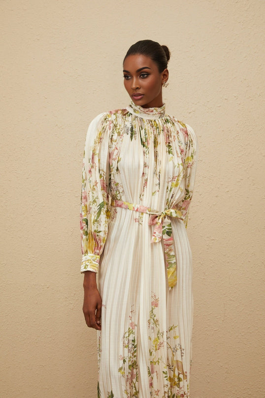 White floral print turtleneck midi dress with cinched waist and pleats