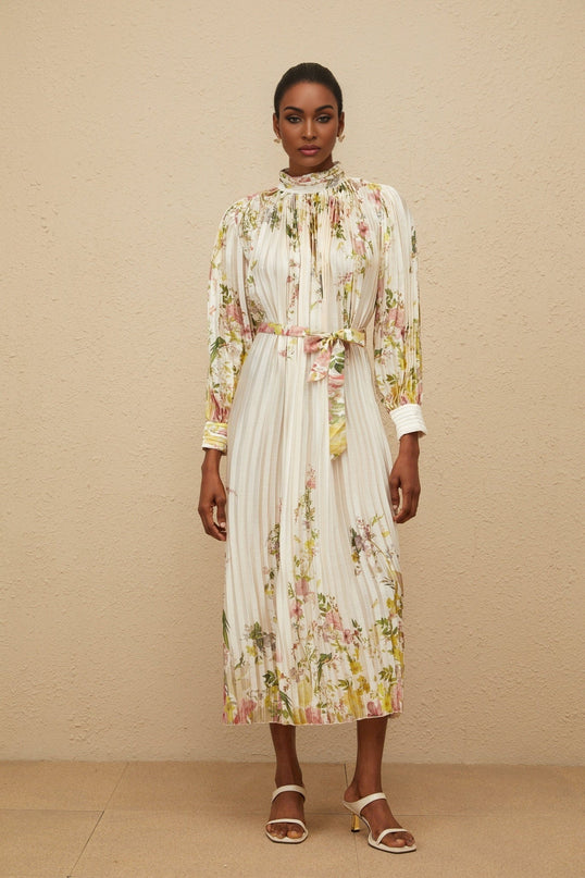 White floral print turtleneck midi dress with cinched waist and pleats