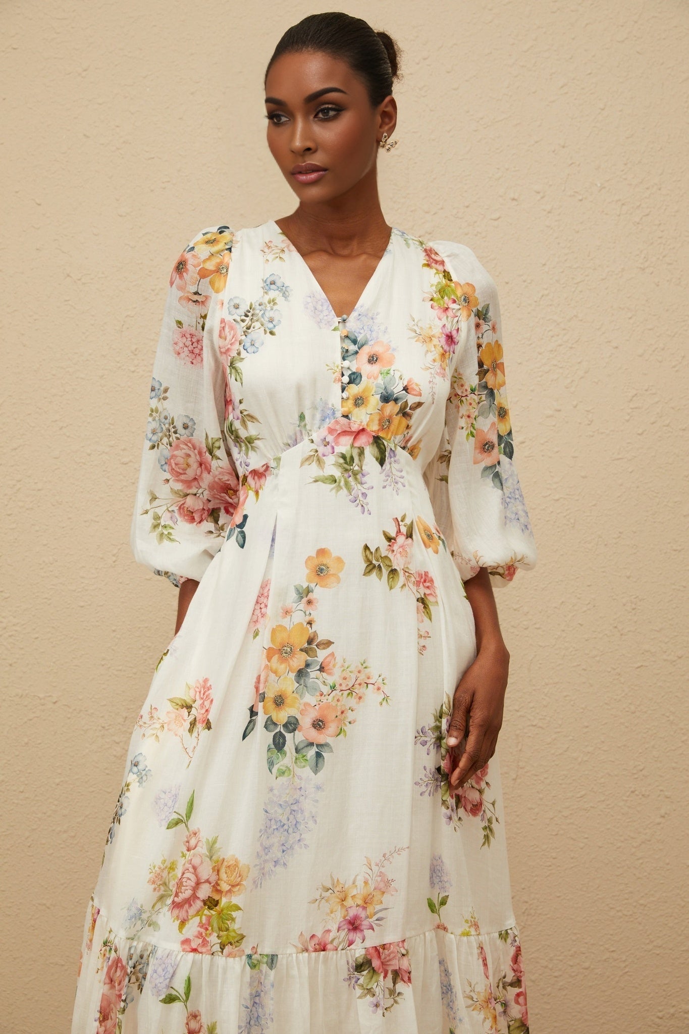 White floral print V-neck maxi dress with long puff sleeves and shirred effect
