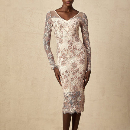 White formfitting midi dress with intricate guipure lace pattern throughout featuring short sleeves and scalloped hem