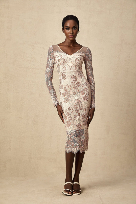 White formfitting midi dress with intricate guipure lace pattern throughout featuring short sleeves and scalloped hem