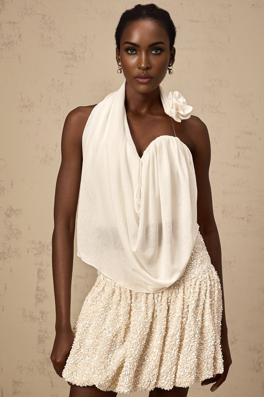 White halterneck top with floral applique details named Maeva