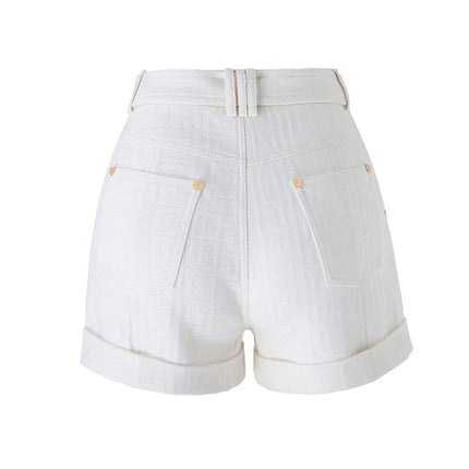 White high-waisted tailored shorts with buckle detail