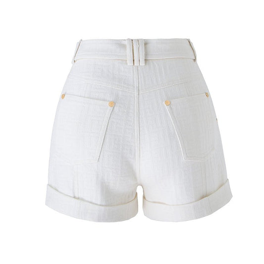 White high-waisted tailored shorts with buckle detail