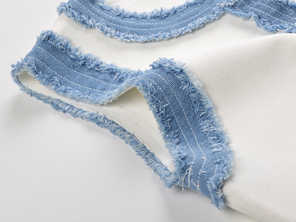 White knit and denim sleeveless dress with pleated hem and gold buttons