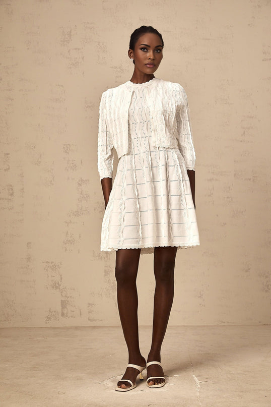 White knitted cardigan with ruffled details named Esmee