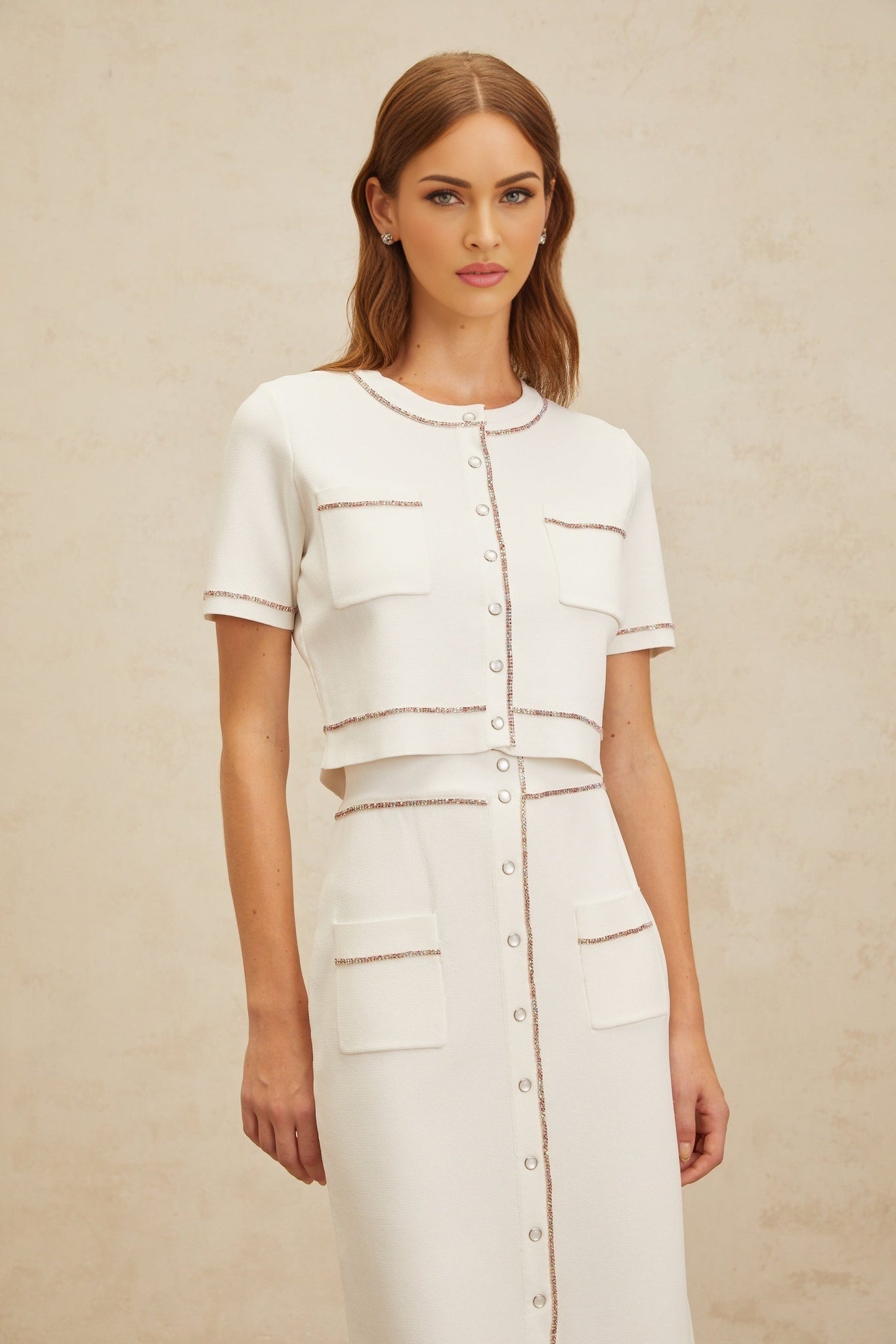 White knitted top and skirt set with crystal embellishment and ribbed hem