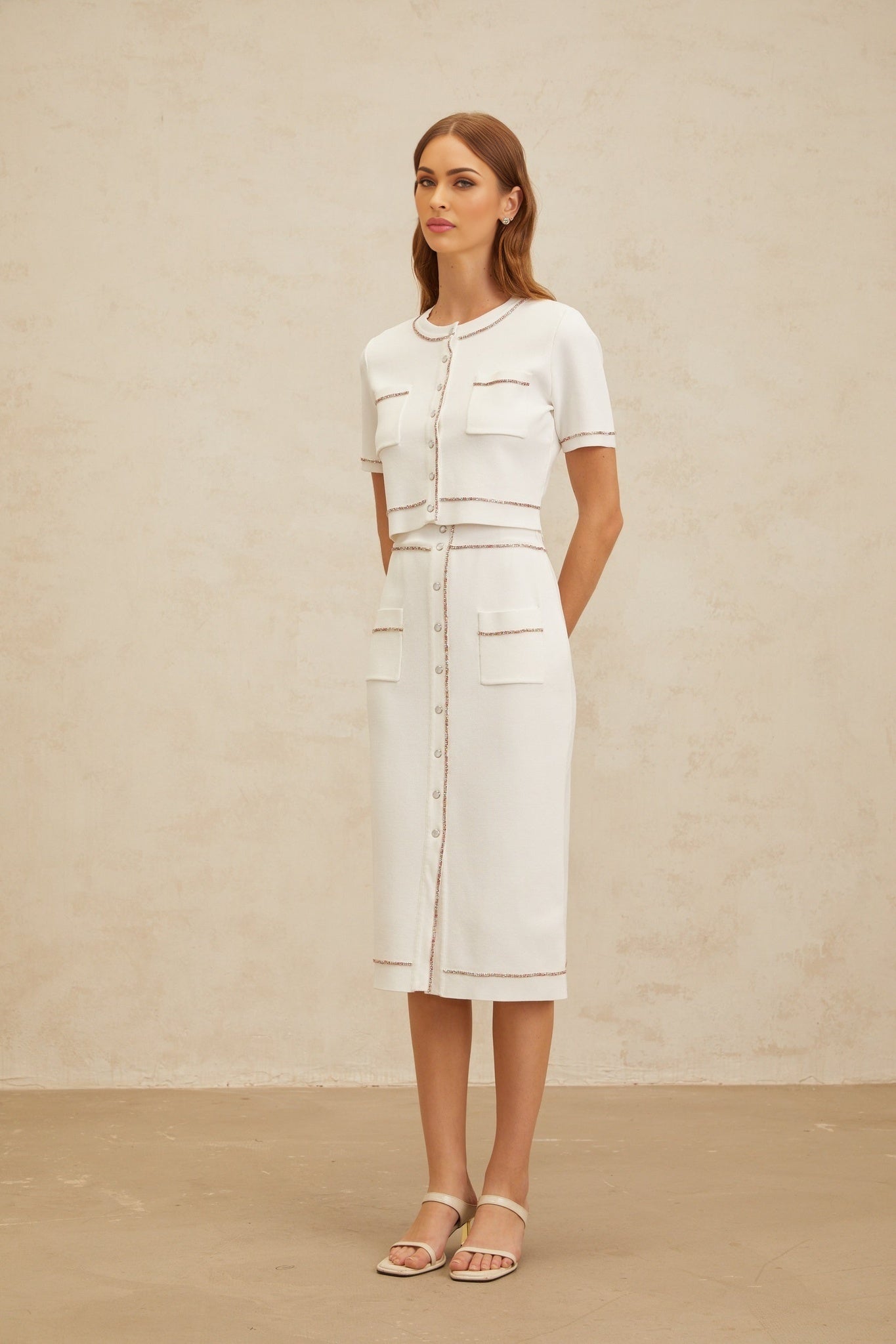 White knitted top and skirt set with crystal embellishment and ribbed hem