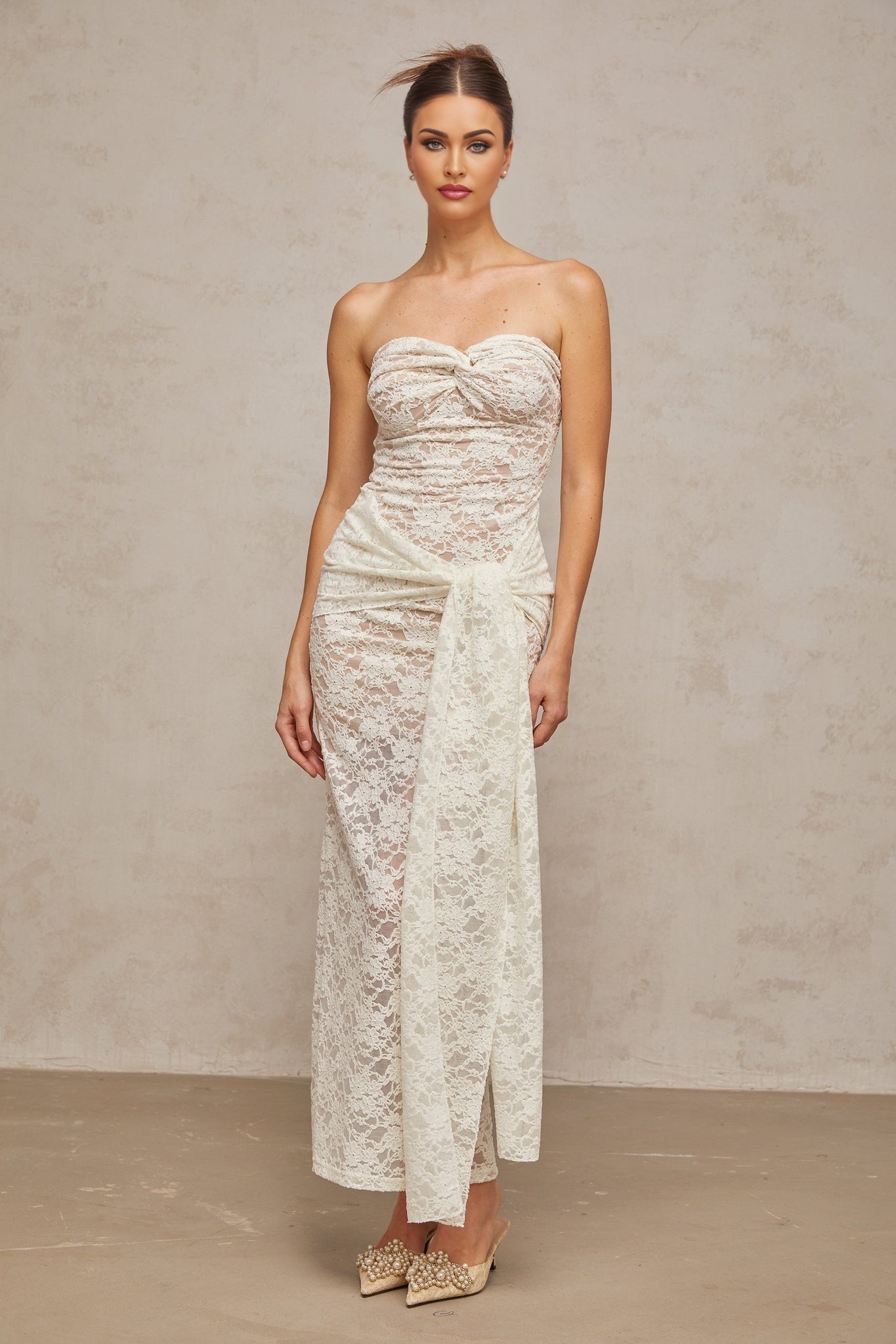 White lace midi dress with draped design and delicate detailing named Wilhelmine