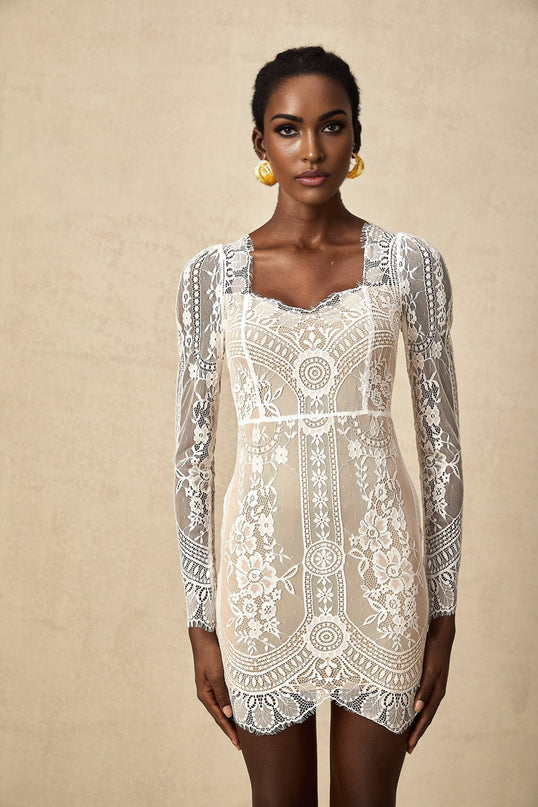 White lace mini dress with scalloped hem and short sleeves