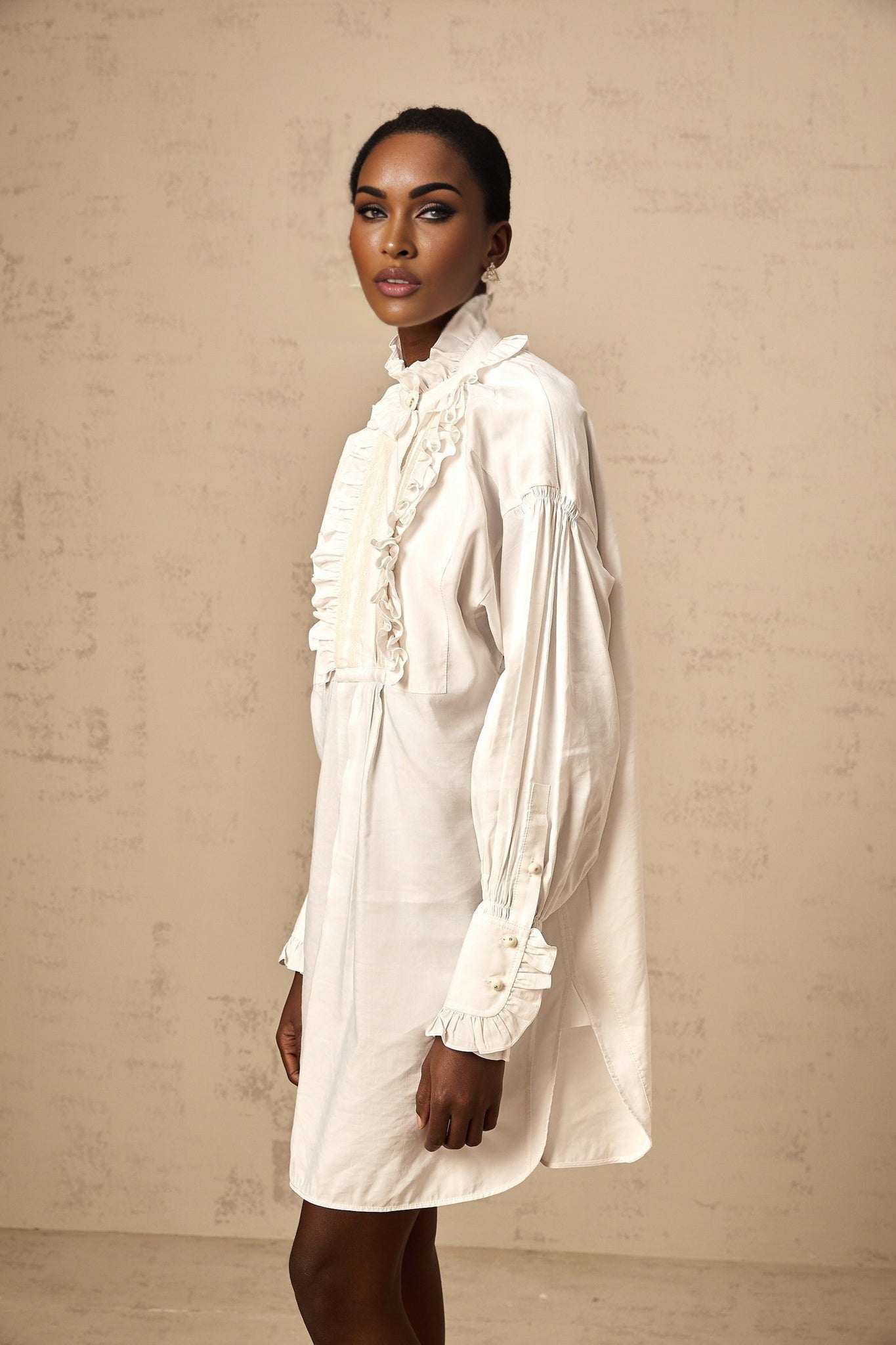White lace trimmed mini shirt dress with ruffles and short sleeves