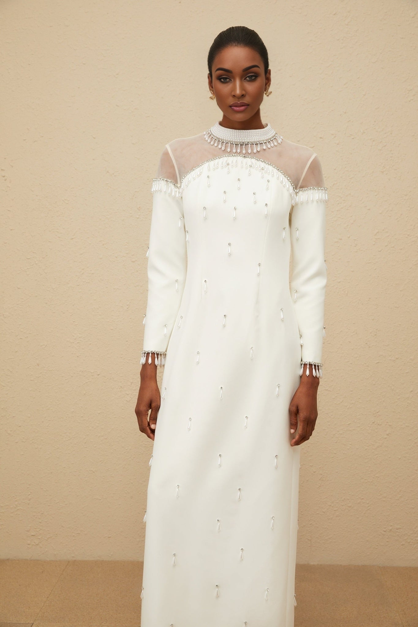 White long sleeve maxi dress with tulle and embellishments
