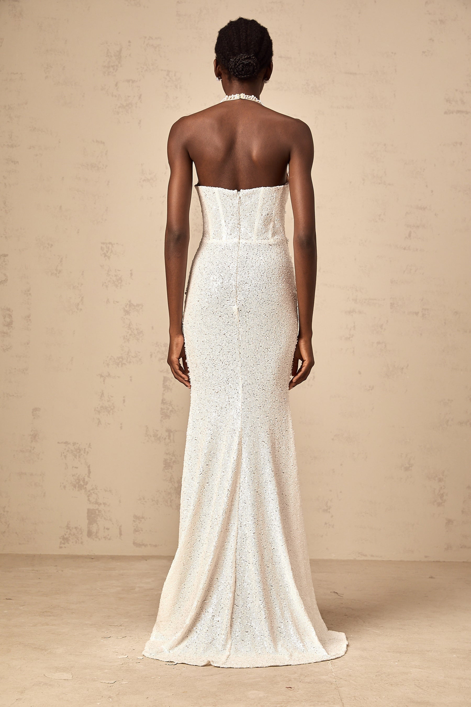 White maxi dress with faux pearl embellishments called Sophie
