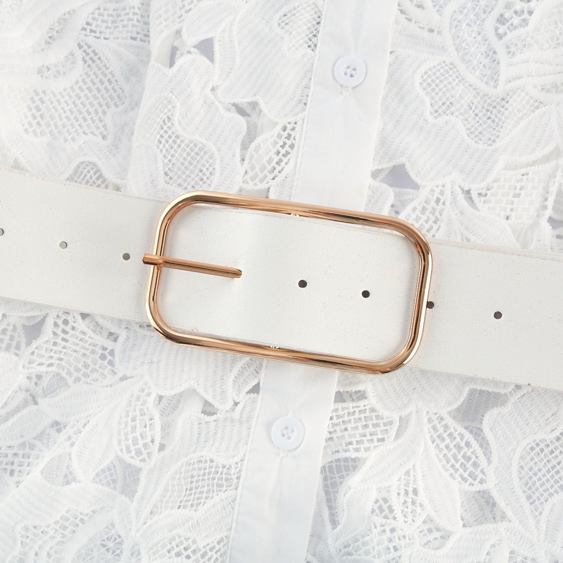 White midi dress with floral embroidery by Noemie
