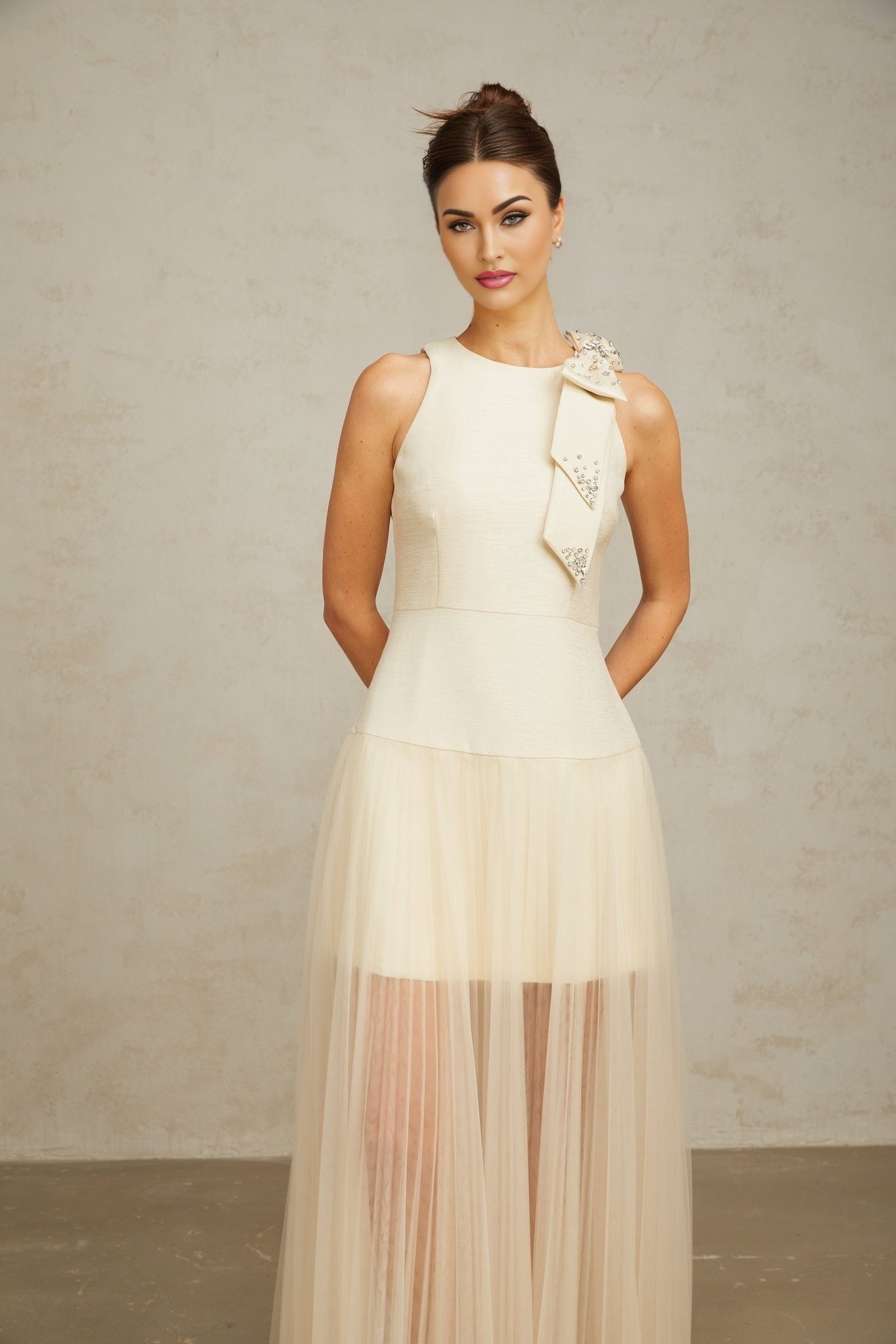 White midi dress with tulle panels and a bow detail named Therese