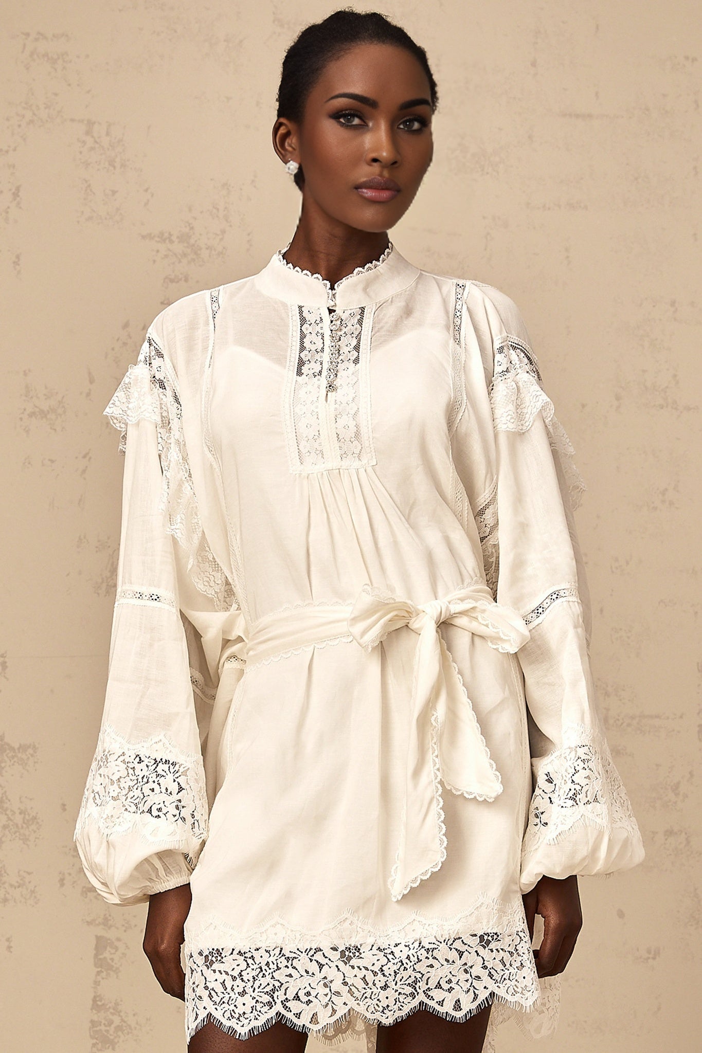 White mini dress with floral lace trim details