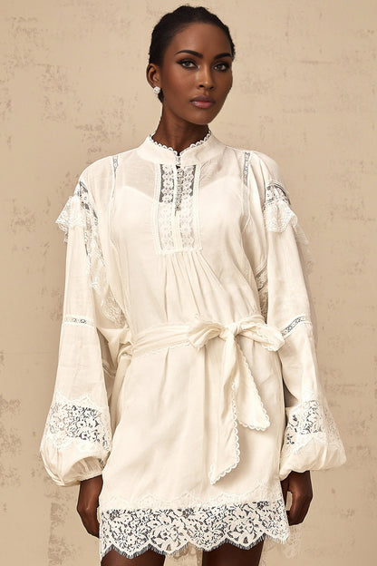 White mini dress with floral lace trim details